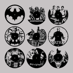 May include: Nine black and white circular vinyl record clock designs. The designs feature characters from popular movies and TV shows, including Batman, Ghostbusters, Star Trek, The Matrix, and The Joker. Each design includes a clock face with Roman numerals.