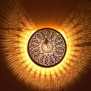 Moroccan round brass wall light
