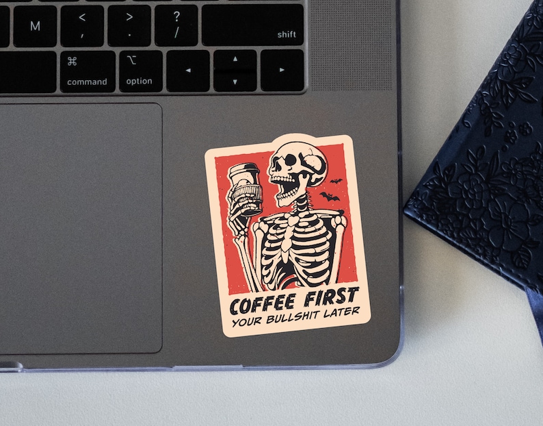 SVG PNG illustration of a skeleton holding a coffee cup with the humorous text Coffee first, Your bullshit later, designed in a playful style to celebrate Halloween. This quirky design combines a love for coffee with a cheeky message.