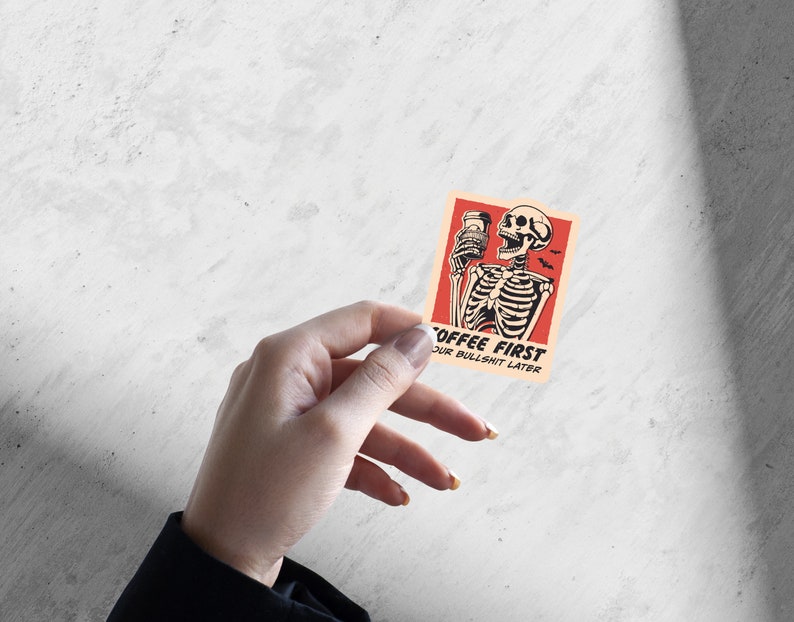 SVG PNG illustration of a skeleton holding a coffee cup with the humorous text Coffee first, Your bullshit later, designed in a playful style to celebrate Halloween. This quirky design combines a love for coffee with a cheeky message.