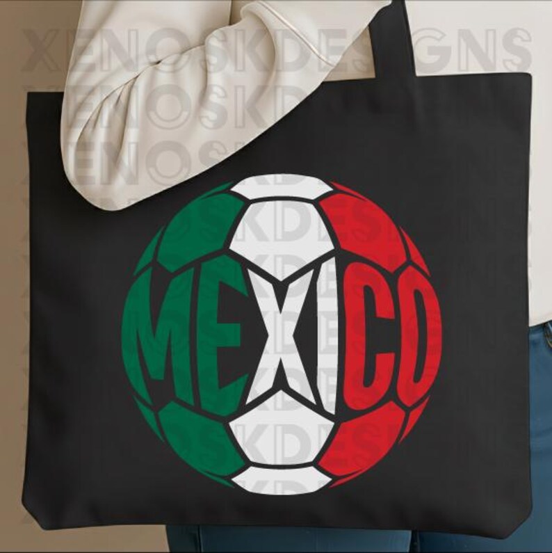 May include: A black tote bag featuring a graphic of a soccer ball designed with the colors of the Mexican flag, green, white, and red. The word MEXICO is printed in large, bold, black capital letters across the center of the soccer ball graphic.