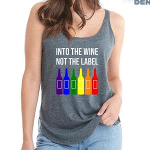 May include: A gray tank top with the text "Into the wine not the label" and a rainbow row of wine bottles printed on the front.