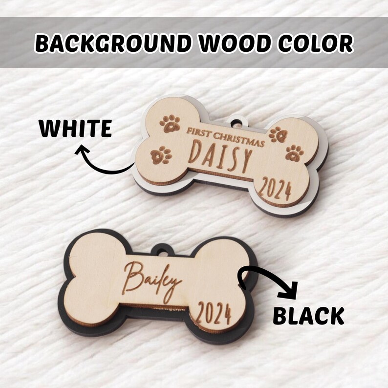 May include: Two bone-shaped pet ornaments. One is light wood with white trim, the name "Daisy", the text "First Christmas", and the year "2024". The other is light wood with black trim, the name "Bailey", and the year "2024".