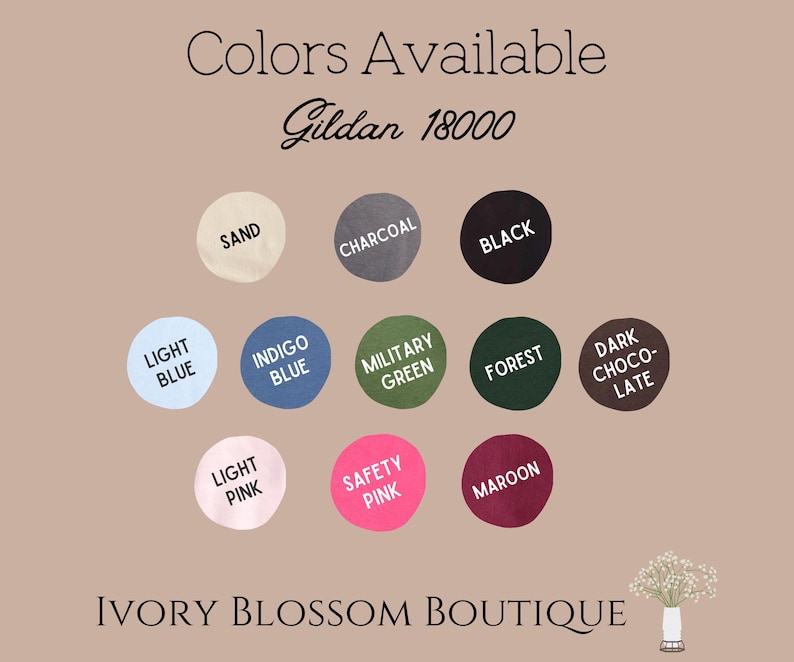 May include: Colour chart for Gildan 18000 t-shirts.  Colours include: Sand, Charcoal, Black, Light Blue, Indigo Blue, Military Green, Forest, Dark Chocolate, Light Pink, Safety Pink, and Maroon.