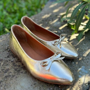 Ballerine dorate a punta hot sale