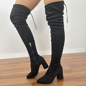 Black suede boots with block heel top