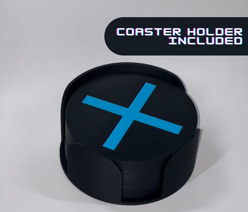 May include: A set of black coasters with a blue X design, stacked in a black holder. Coaster holder included.