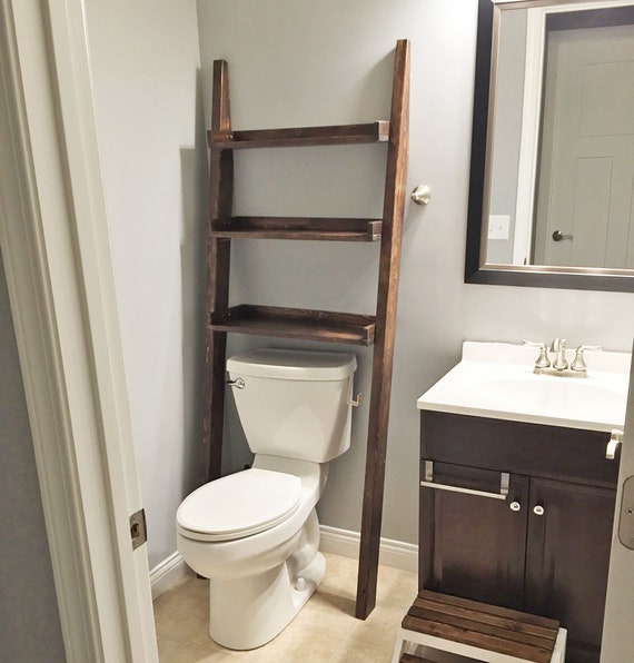behind toilet storage