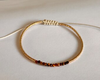 Fine beaded bracelet with soft gold Miyuki Japanese beads and beautiful tiger eye stones.