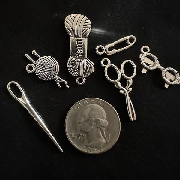 Set of 6 detailed knitting charms. Includes yarn, knitting needles, sewing needle, scissors, glasses and a cute safety pin.