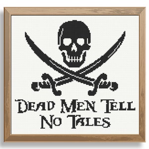 May include: Cross-stitch artwork in a wooden frame. The design features a black skull and crossed swords, with the text "Dead Men Tell No Tales" below. The background is white.