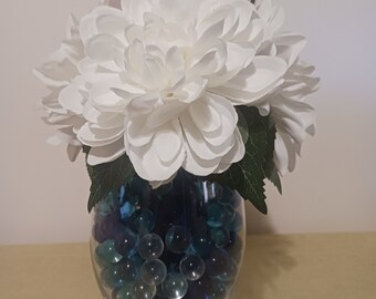 White dahlias, pink dahlia, glass vase, mix blue clear glass.