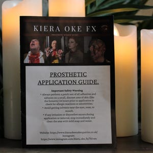 May include: A black and white Prosthetic Application Guide with images of people with special effects makeup. The guide is in front of three white LED candles with a warm glow. The text includes safety warnings and a website.