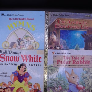 Pequeños libros dorados surtidos