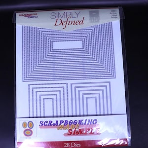 Puede incluir: Un paquete de 28 troqueles metálicos para scrapbooking, con formas de rectángulos anidados. El paquete tiene las palabras "SIMPLY Defined" y "SCRAPBOOKING Made SIMPLE".