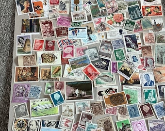 100 worldwide stamps, all different, old and new, many countries.ideal for a collection or collage and crafting