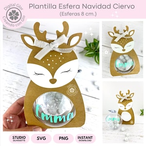 Op de afbeelding: Een printbare sjabloon voor een kerst rendier ornamentenhouder. De sjabloon is ontworpen om een ​​8 cm bol te houden. De sjabloon is bruin met witte accenten en een wit lint. De sjabloon wordt getoond met een doorzichtige bol met witte glitter erin.