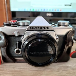 Olympus OM1 Camera with 2 Zuiko Lenses