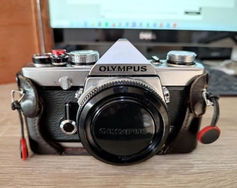 Olympus OM1 Camera with 2 Zuiko Lenses