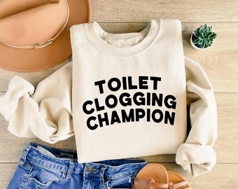 T-shirt toiletverstopping kampioen, grappige badkamer humor hoodie cadeau, grap grap graphic T-shirt voor mannen en vrouwen