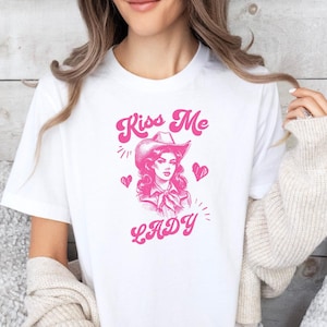 Lesbian Cowboy Shirt, Kiss Me Lady T-Shirt, LGBTQ Cowgirl Pride Tee, Western Lesbian Apparel, Fuschia Lesbian Graphic Shirt, Gay Pride Gift