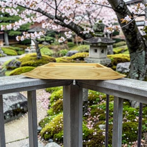 May include: A set of three ceramic mugs with a speckled, matte finish. The mugs are in shades of cream, light gray, and dark gray. Each mug has a simple, minimalist design and a rounded handle. Perfect for coffee or tea.