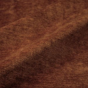May include: A piece of fabric with a deep, rich rust-brown color. The material features a dense, short-pile texture that creates subtle variations in light and shadow across its surface, highlighting a soft, matte, and uniform appearance.