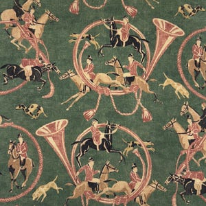 May include: Green fabric with a repeating pattern of riders on horseback, hunting dogs, and French horns. The riders wear red coats and black riding hats. The horns and decorative elements are in shades of red and beige.