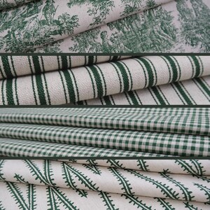 May include: A collection of four folded fabric swatches featuring green and off-white patterns. The designs include a pastoral toile print, vertical stripes, a small gingham check, and a repeating fern-like botanical motif on woven textile.