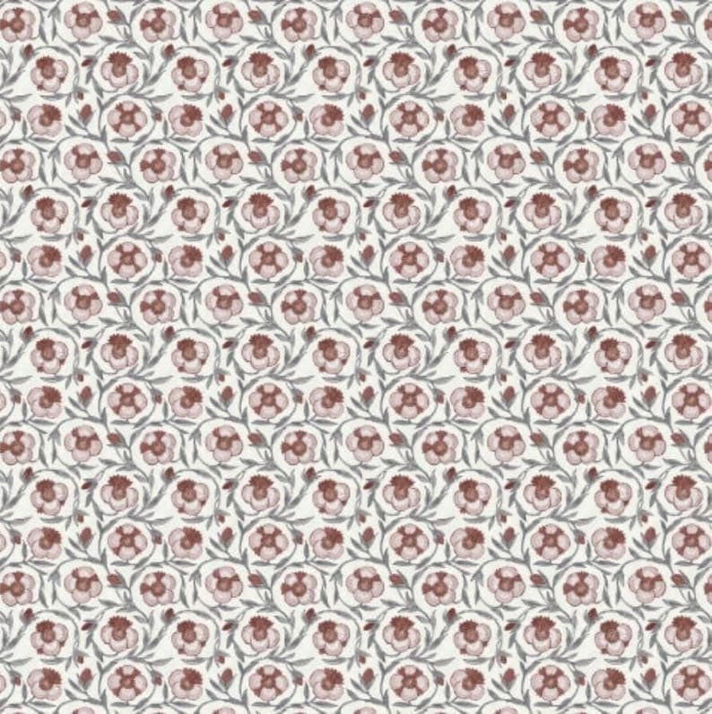 Muted red drapery textile with vintage floral pattern in dusty rose and maroon suitable for stylish home decor and upholstery