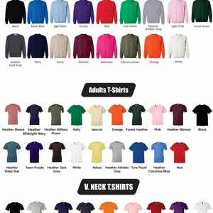 May include: A variety of t-shirts and sweatshirts in various colors, including black, blue, green, and red. The image displays crew neck sweatshirts, adult t-shirts, and V-neck t-shirts. Each item is labeled with its color name.