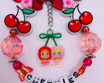 crying girl crying for love cherries keychain/phone acessory