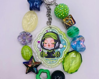 Black and Green themed skull panda keychain/phone accessory