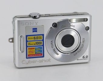 Sony Cyber-shot DSC-W30 Digital Camera Working but shows signs of use (no charger and battery)