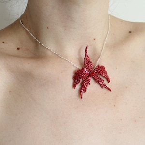 Red baroque orchid flower pendant necklace
