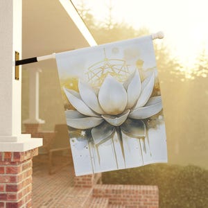 May include: A white and gold watercolor painting of a lotus flower with geometric shapes in the background. The flower is depicted with delicate details and a soft, ethereal quality.