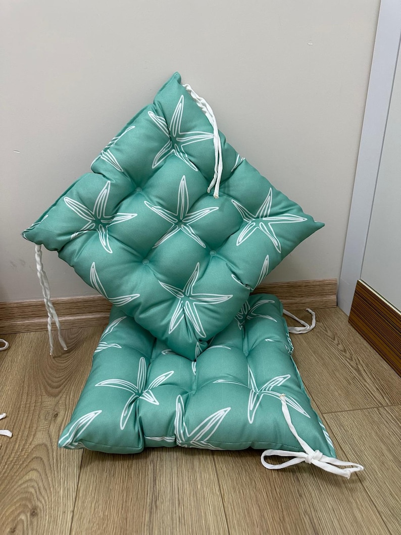 a chair made out of a cushion on the floor