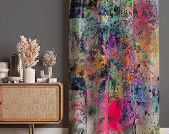 May include: A floor-length curtain featuring a vibrant, multi-colored abstract paint splatter pattern with splashes of hot pink, orange, purple, blue, and green against a textured background, hanging vertically with soft, uniform fabric folds.