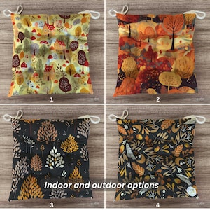 May include: Four different cushion covers with autumnal designs. The first cushion cover features a yellow and brown pattern with houses and trees. The second cushion cover features a red, orange, and yellow pattern with trees. The third cushion cover features a black and gold pattern with trees. The fourth cushion cover features a black and gold pattern with leaves. The text "Indoor and outdoor options" is printed on the image.