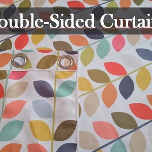 a close up of a colorful umbrella with the words double - sided curtains