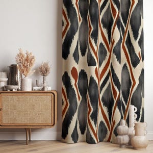 a room with a cabinet and a curtain