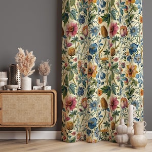 a room with a table, vases and a curtain