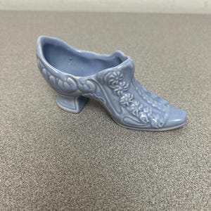 Vintage Porcelain Victorian style shoe, blue with small raised flowers, 5” in length.
