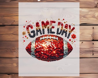 May include: A DTF transfer design featuring a football with red and silver sequins, the words "GAME DAY" in sequined letters, and the text "Ready To Press" and "DTF Transfer". The design is on a white background.