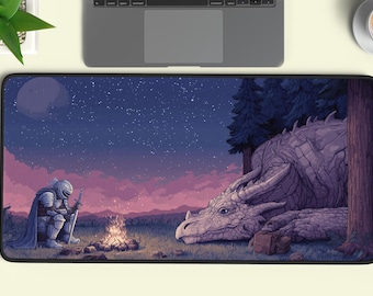 May include: A rectangular mousepad with a fantasy illustration. A knight sits by a campfire, opposite a large dragon. The background depicts a starry night sky and a purple and pink sunset. The mousepad has a black border.