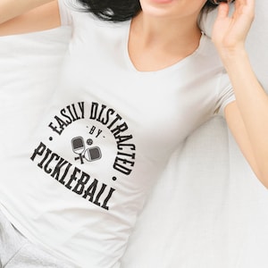 Easily Distracted V-Neck T-shirt for Pickleballers!  Great shirt to show off your favorite sport, Pickleball!