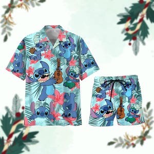 May include: A light blue Hawaiian shirt and matching shorts set. The set features a repeating pattern of the character Stitch, pink flowers, and green leaves. The shirt has a button-down front and short sleeves. The shorts have a drawstring waist.