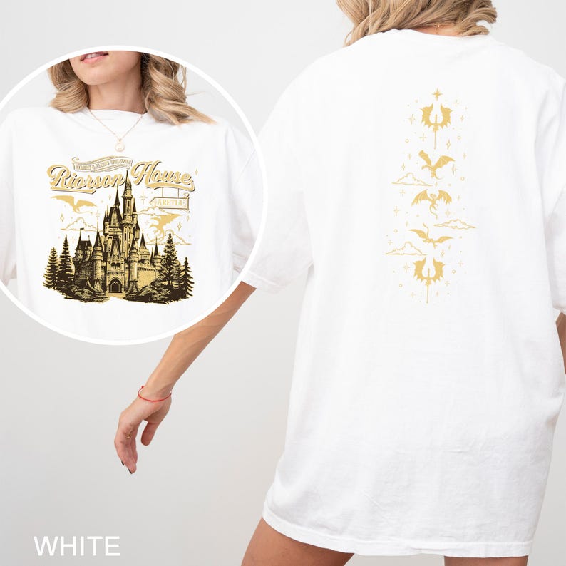 May include: White t-shirt with a gold graphic on the front featuring a castle, trees, and the text "Rirson House" and "Aretta". The back of the shirt has a gold dragon design. The shirt is a casual, oversized fit.