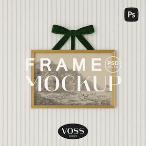 May include: A gold rectangular frame with a landscape print, hanging from a green velvet bow. The frame has the text "FRAME MOCKUP" in white. The image is against a striped background.