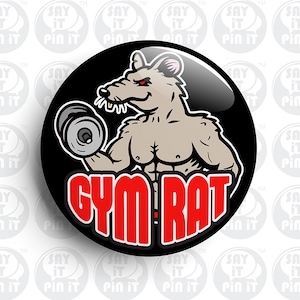 May include: A black and white button with a cartoon image of a muscular rat lifting a dumbbell. The rat has red eyes and the text "GYM RAT" is written in red letters below the rat.